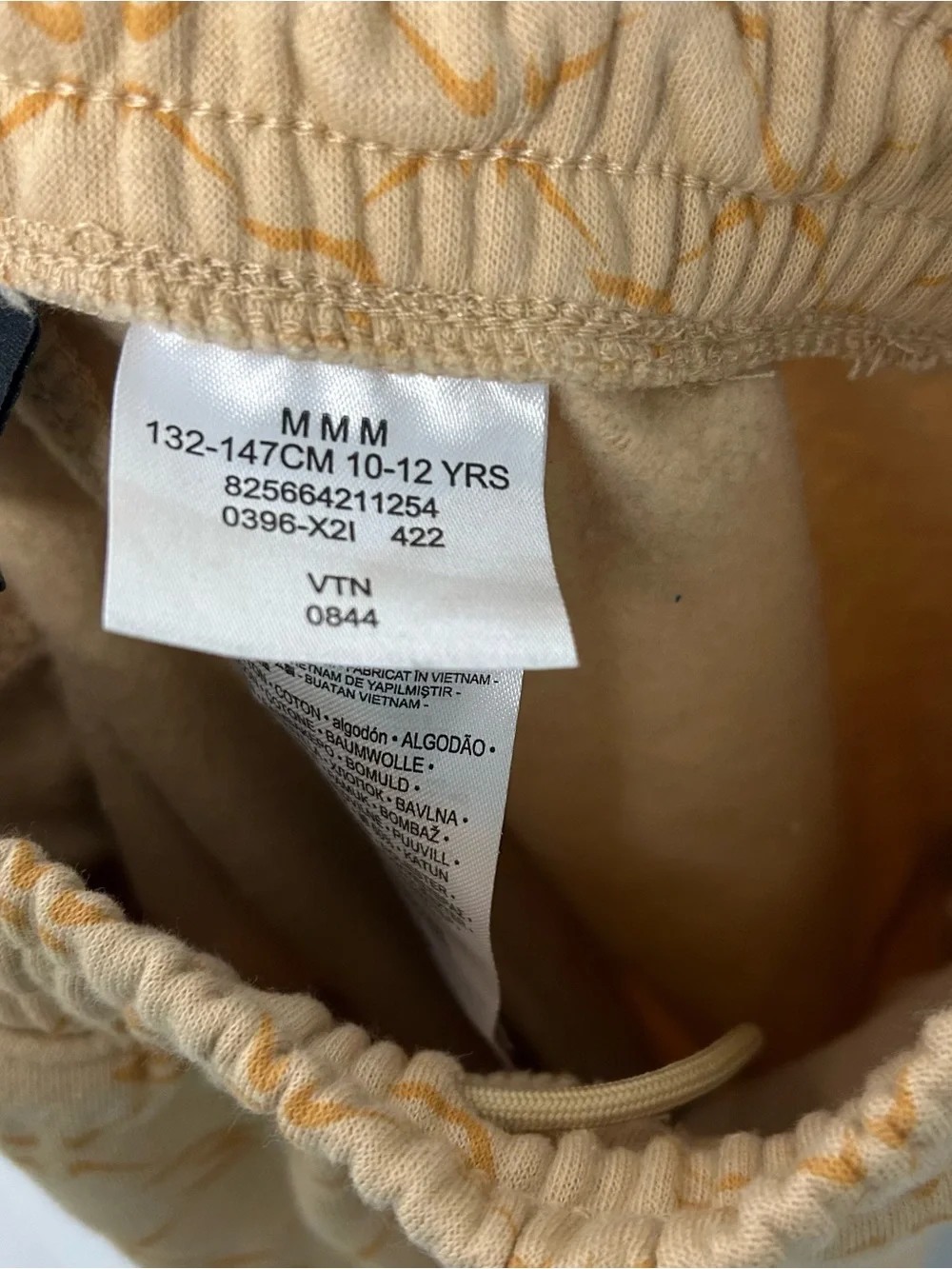 Nike Youth Light Yellow Patterned Joggers with Black Swoosh